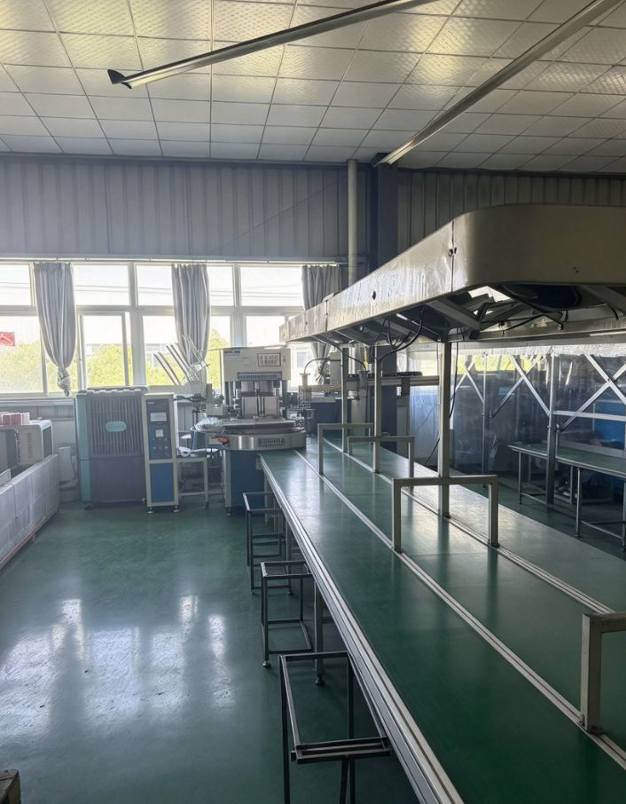 Conveyor feeding the assembly line
